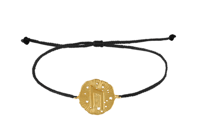 String bracelet with Uruz runic medallion talisman. Gold plated