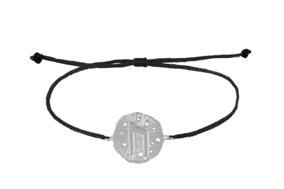 String bracelet with Uruz runic medallion talisman. Silver