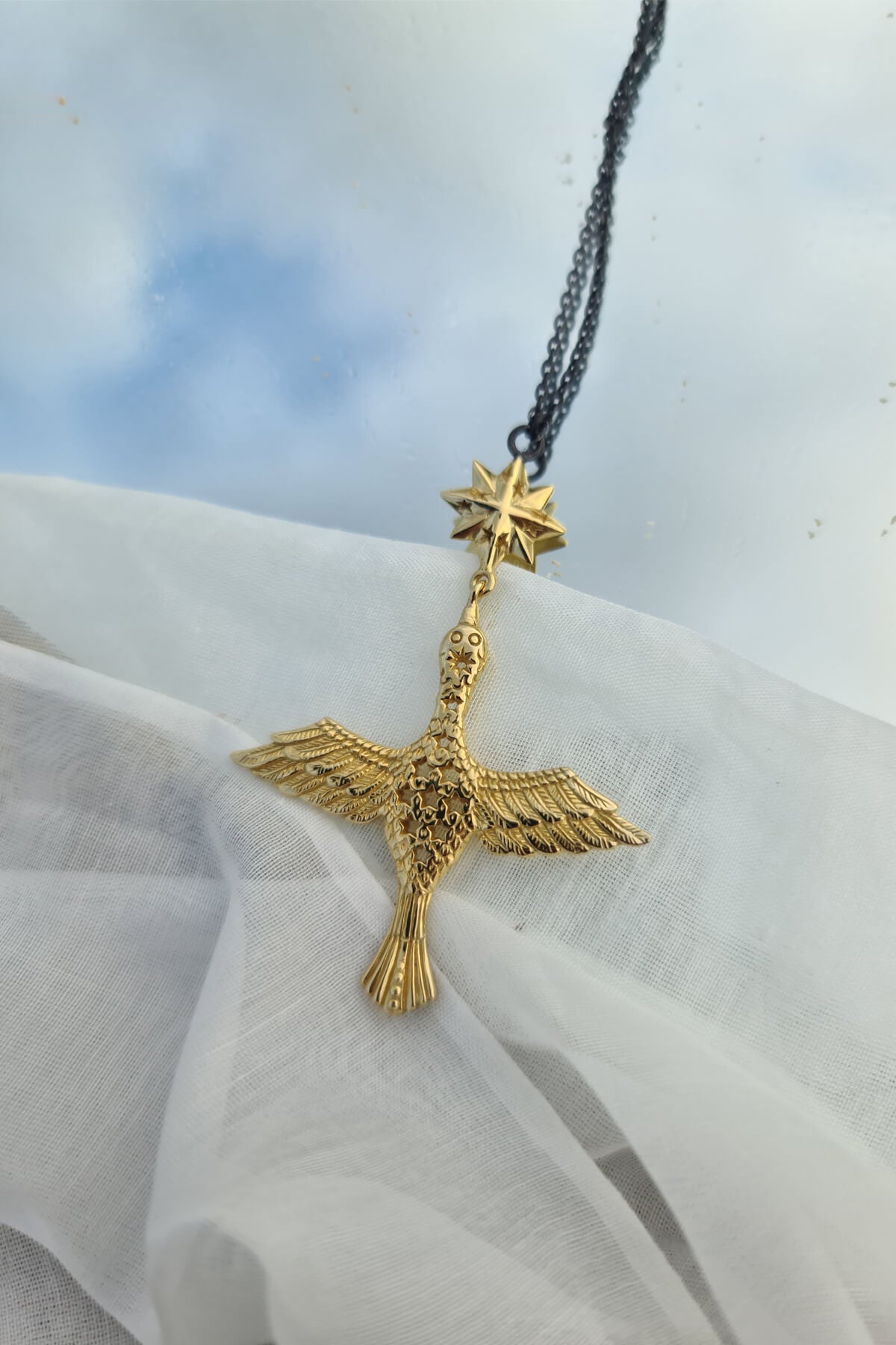 Fairy bird and 8-pointed star necklace. Silver, gold-plated, oxidized