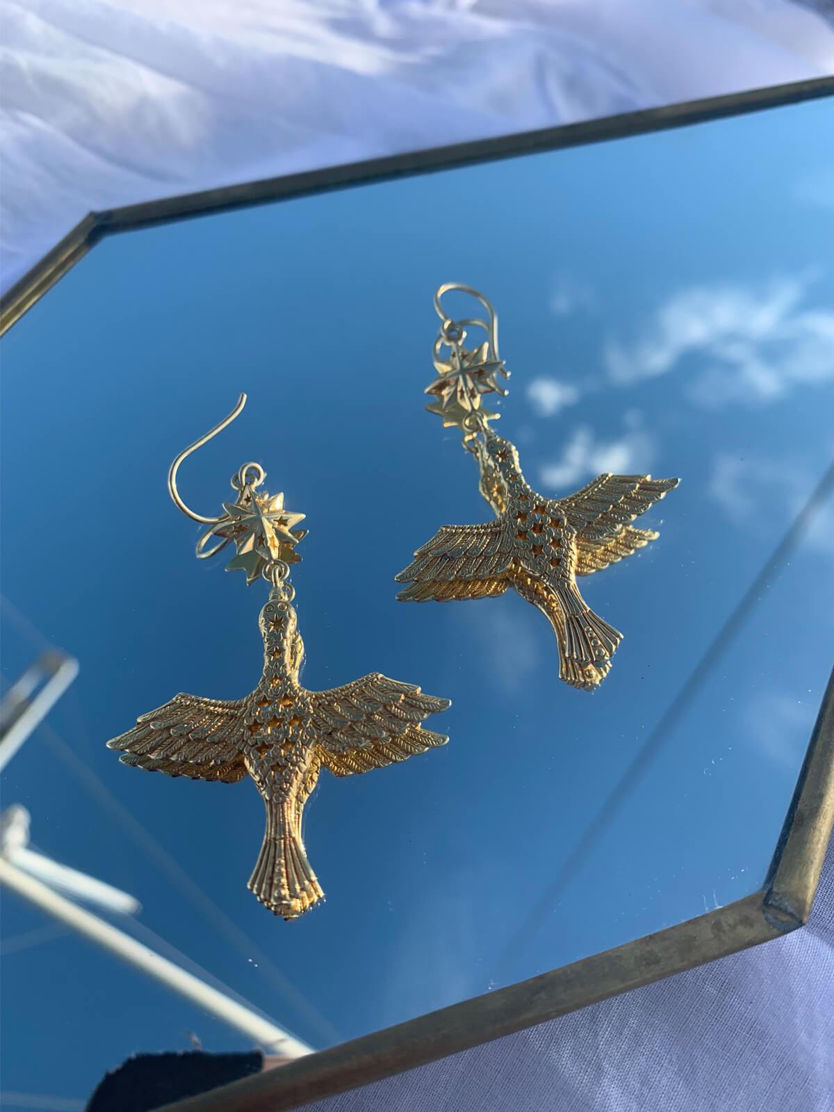 Fairy bird and 8-pointed star earrings. Silver