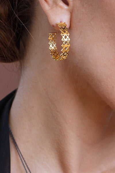 Life Force medium hoop earrings. Silver, gold-plated