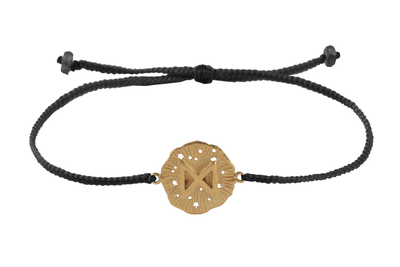 String bracelet with runic medallion amulet Dagaz. Gold plated