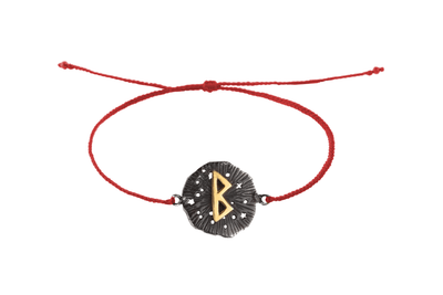 String bracelet with runic medallion amulet Berkana. Gold plated and oxide