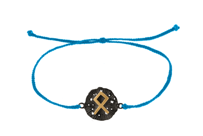 String bracelet with runic medallion amulet Odal. Gold plated and oxide