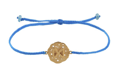 String bracelet with runic medallion amulet Dagaz. Gold plated